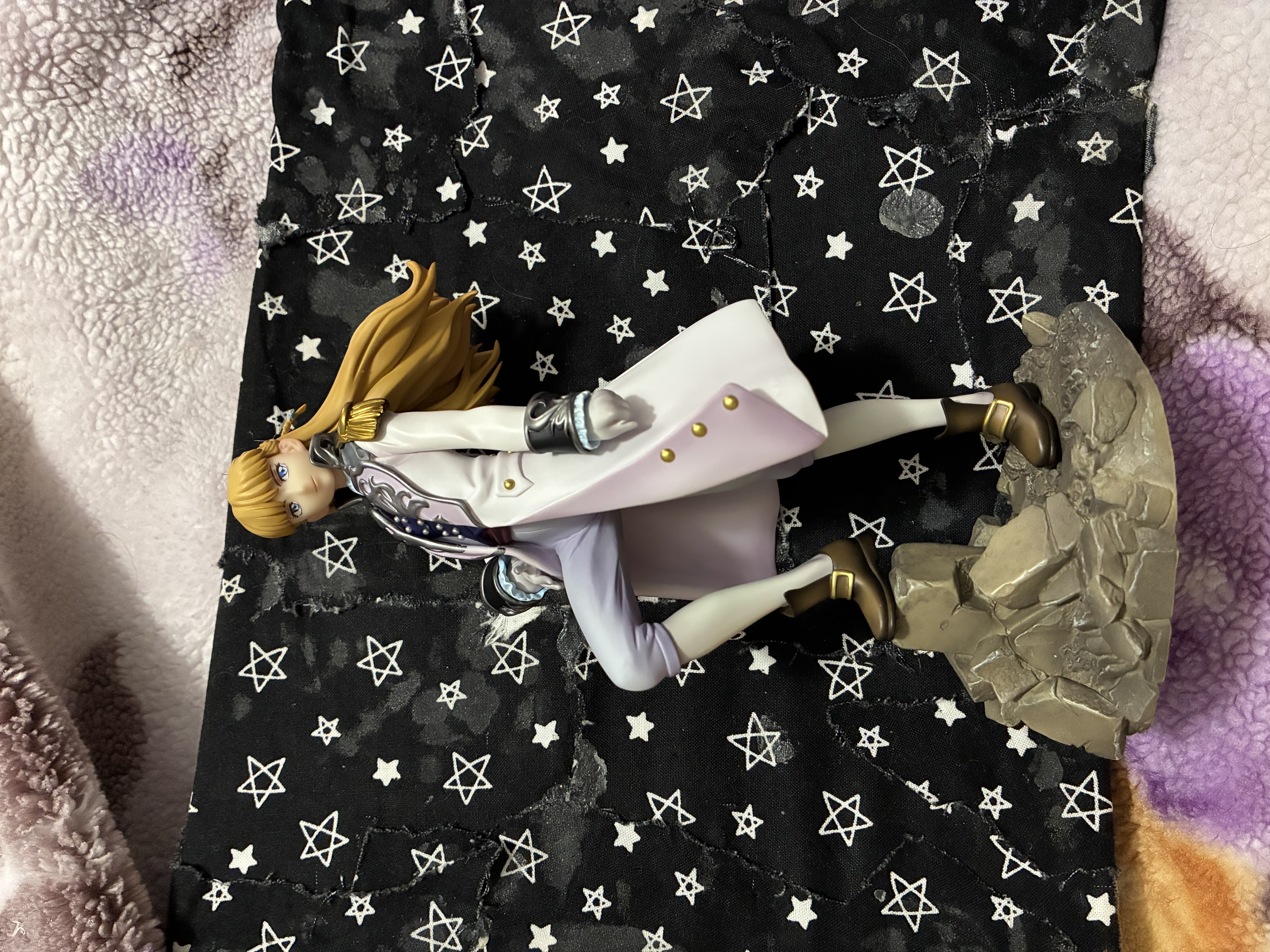 Front of Gundam wing Relena figure in her Sanc outfit standing on rubble.